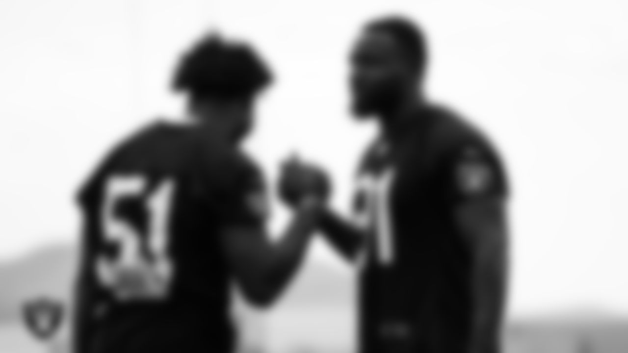 Las Vegas Raiders defensive end Malcolm Koonce (51) and defensive end Yannick Ngakoue (91) on the field for practice at 2021 Training Camp.