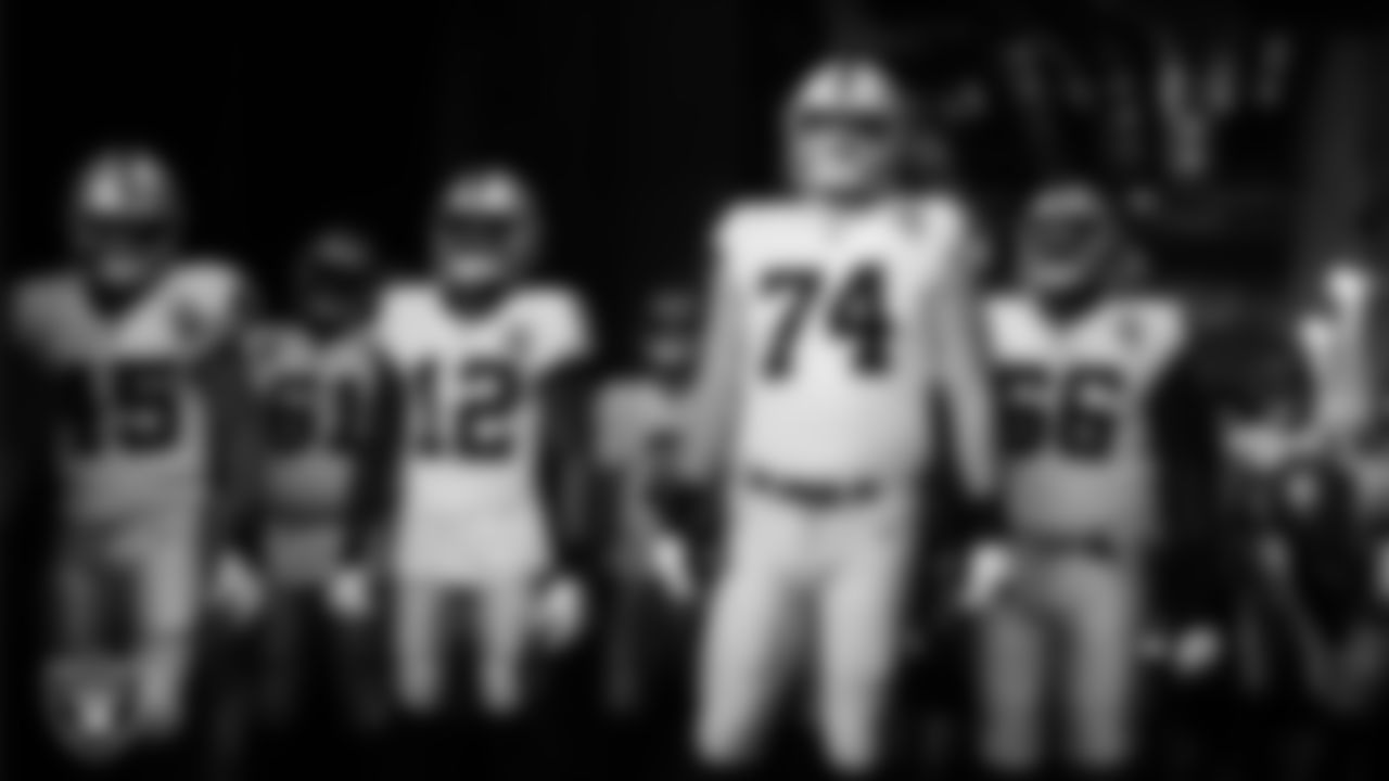 Las Vegas Raiders fullback Alec Ingold (45), wide receiver Zay Jones (12), tackle Kolton Miller (74) and guard Gabe Jackson (66) wait to be introduced onto the field before the regular season away game against the Atlanta Falcons.