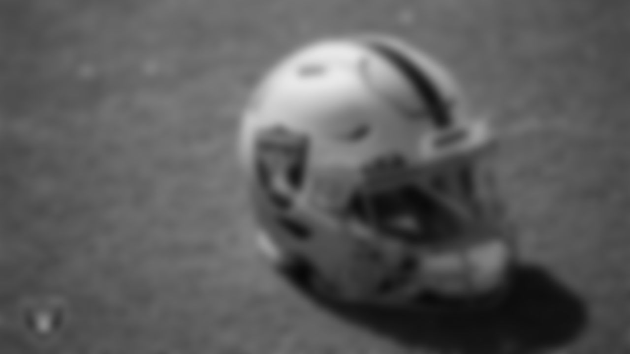 A Las Vegas Raiders helmet on the field during practice at Intermountain Healthcare Performance Center.