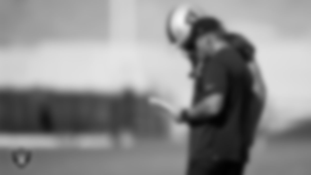 Las Vegas Raiders quarterback Derek Carr (4) and Head Coach Jon Gruden on the field for practice at 2021 Training Camp.