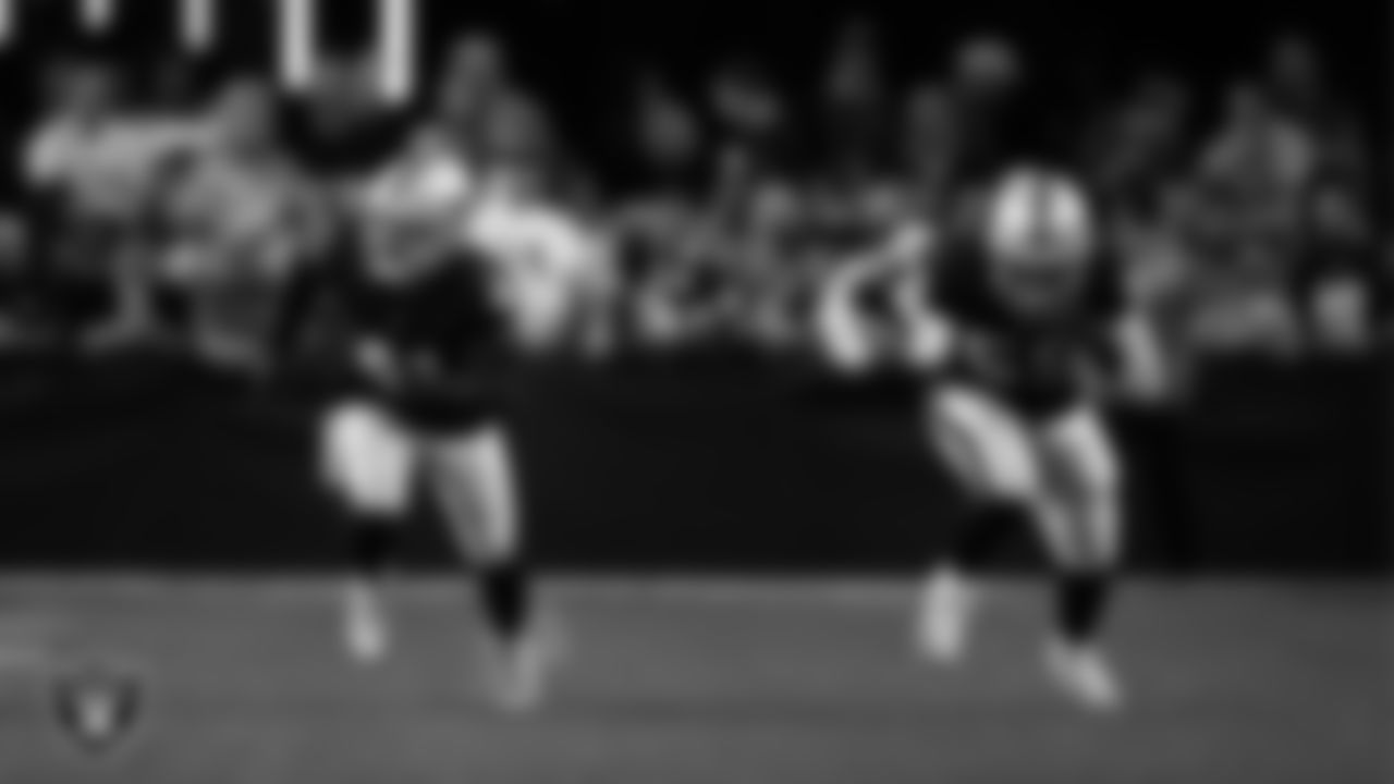 Las Vegas Raiders safety Matthias Farley (41) and linebacker Luke Masterson (59) head down field after a kickoff during the regular season home game against the Los Angeles Chargers at Allegiant Stadium.