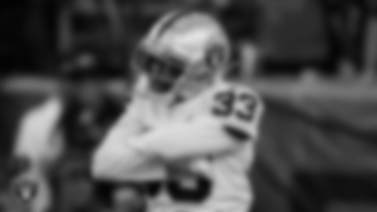 Las Vegas Raiders safety Roderic Teamer (33) celebrates during the regular season away game against the Denver Broncos.