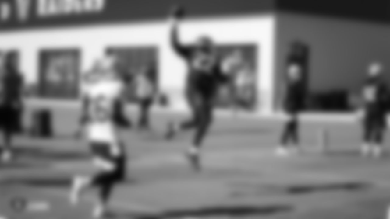 Raiders cornerback Keisean Nixon (22) makes a catch during practice.