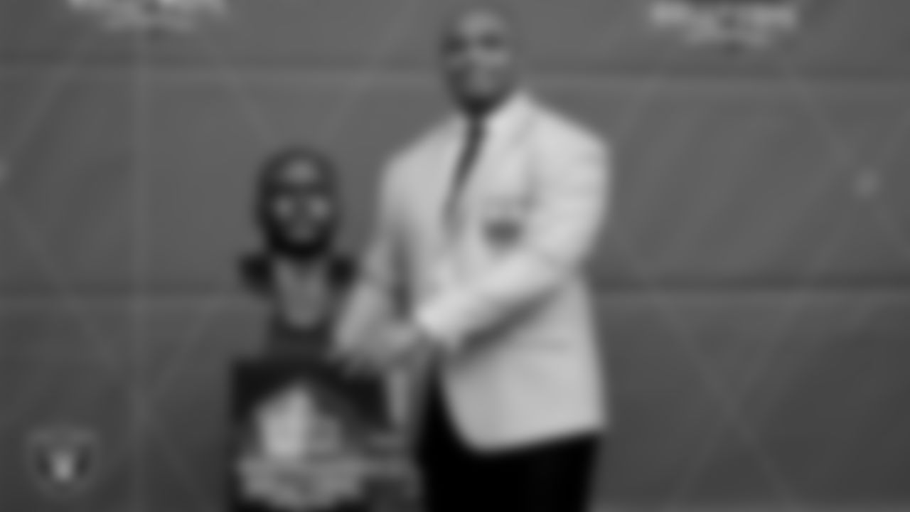 Hall of Famer Richard Seymour with his bust during the Class of 2022 Enshrinement.