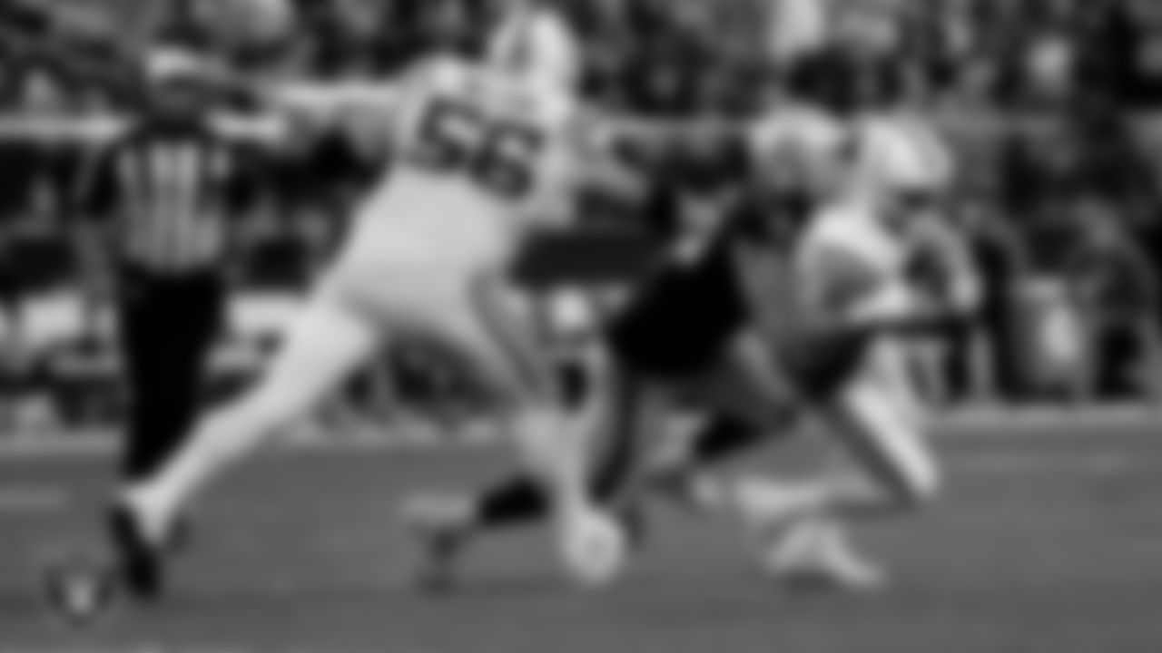 Las Vegas Raiders defensive end Maxx Crosby (98) sacks the quarterback during the regular season home game against the Indianapolis Colts at Allegiant Stadium.