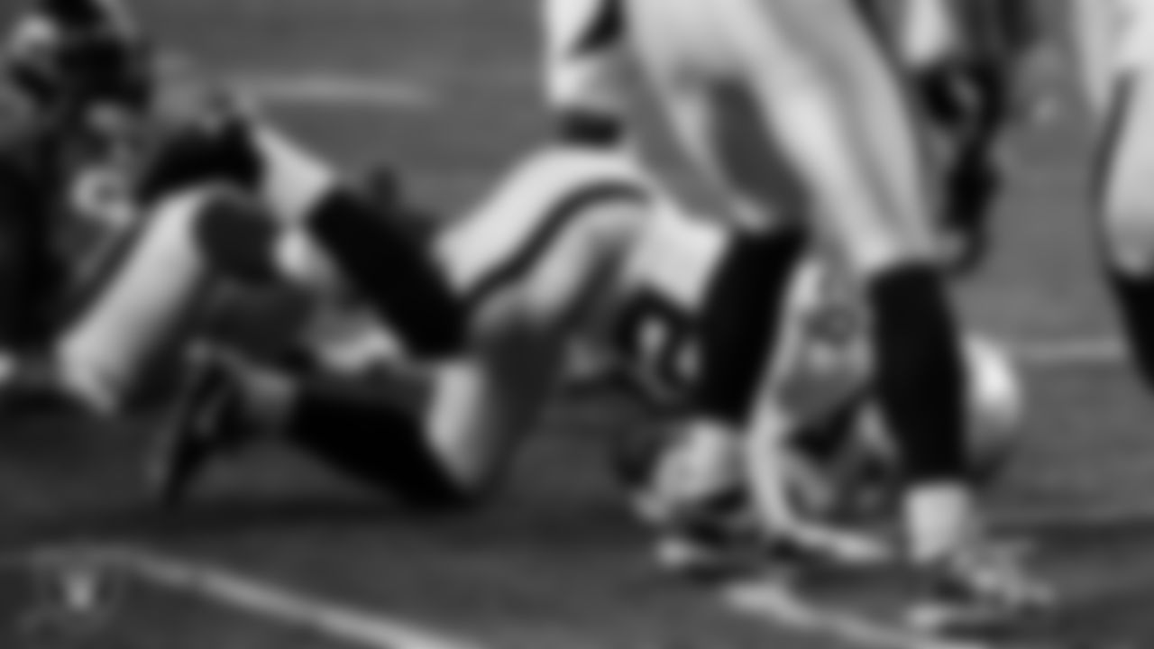 Las Vegas Raiders running back Josh Jacobs (28) rushes for a 1-yard touchdown during the regular season away game against the Denver Broncos.