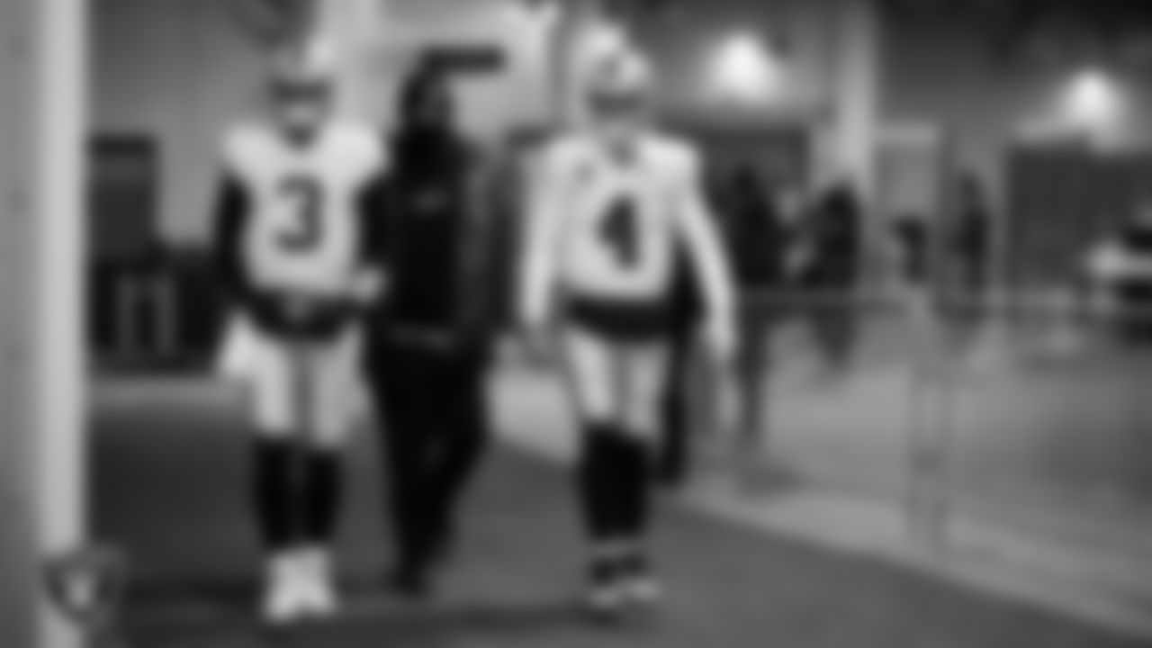 Las Vegas Raiders quarterback Jarrett Stidham (3), quarterback Chase Garbers (15) and quarterback Derek Carr (4) walk down the tunnel before the regular season away game against the Pittsburgh Steelers at Acrisure Stadium.