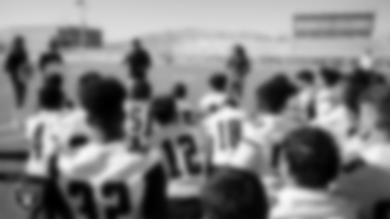 Las Vegas Raiders alumnus Leo Gray answers questions from the Somerset Academy Losee football team.