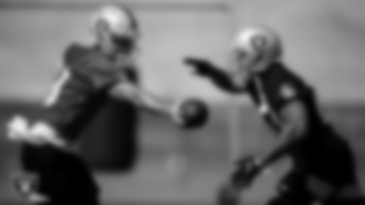 Las Vegas Raiders quarterback Nathan Peterman (3) and running back Devontae Booker (23) during practice.
