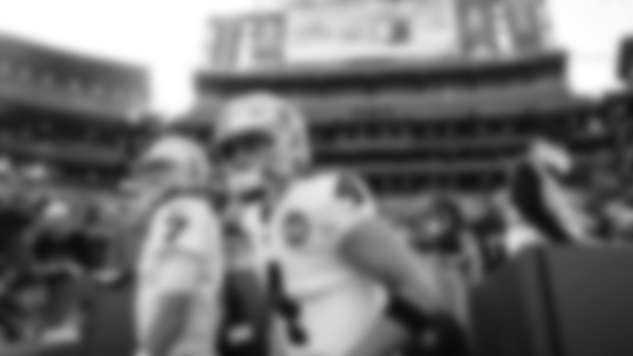 Raiders quarterback Derek Carr (4) warms up before the regular season game against the Green Bay Packers at Lambeau Field.