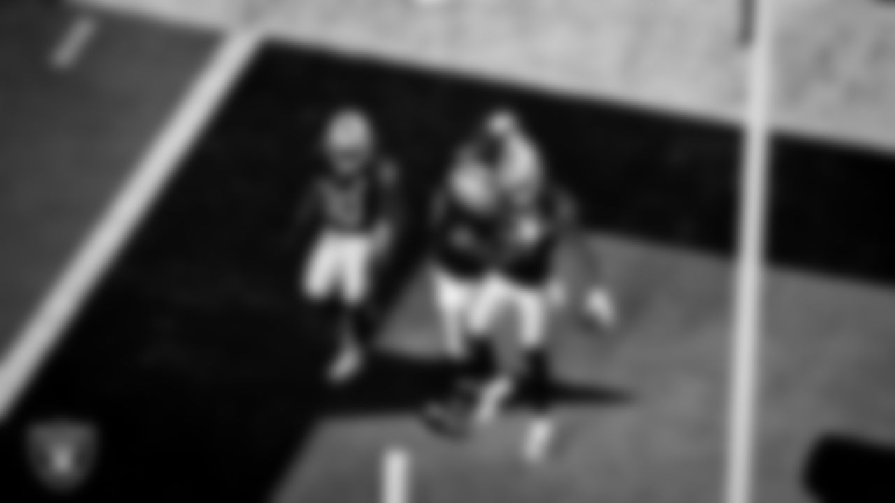 Las Vegas Raiders wide receiver Zay Jones (12) is congratulated by center Rodney Hudson (61) after a 15-yard touchdown catch during the regular season home game against the New Orleans Saints.