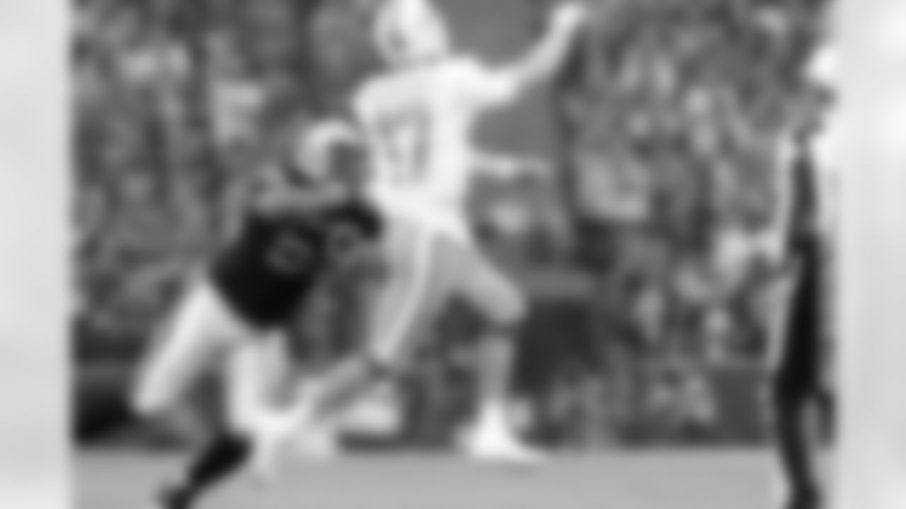 DE LaMarr Woodley pressures QB Ryan Tannehill.
