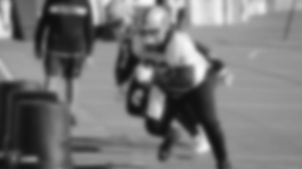 Raiders center Erik Magnuson (62) goes through offensive drills during practice.