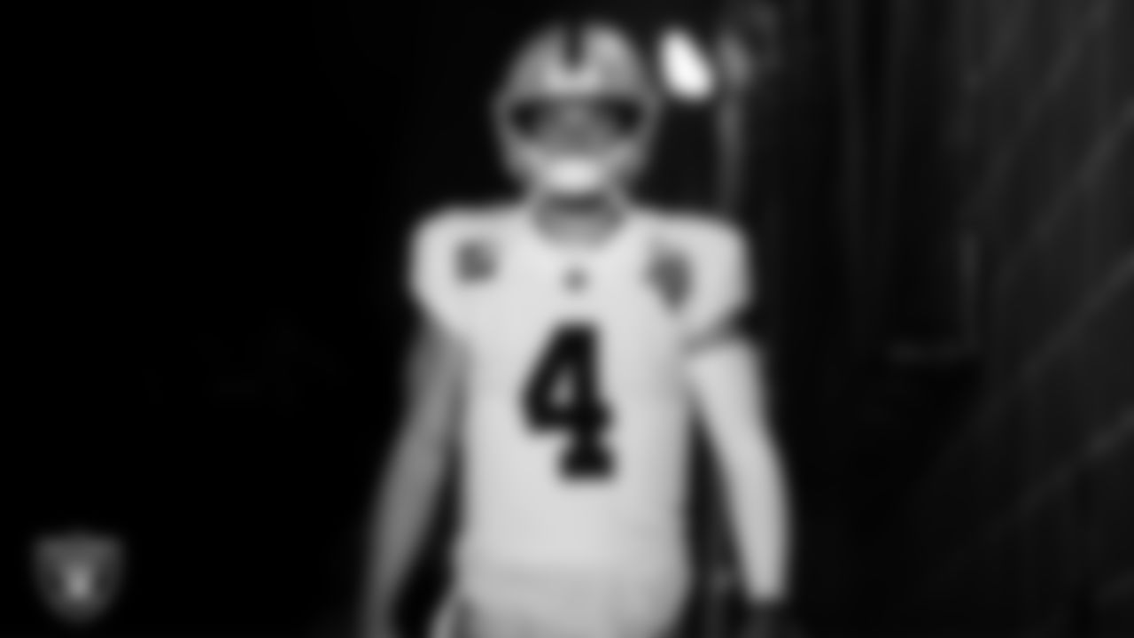 Las Vegas Raiders quarterback Derek Carr (4) walks down the tunnel before the regular season away game against the New York Jets.