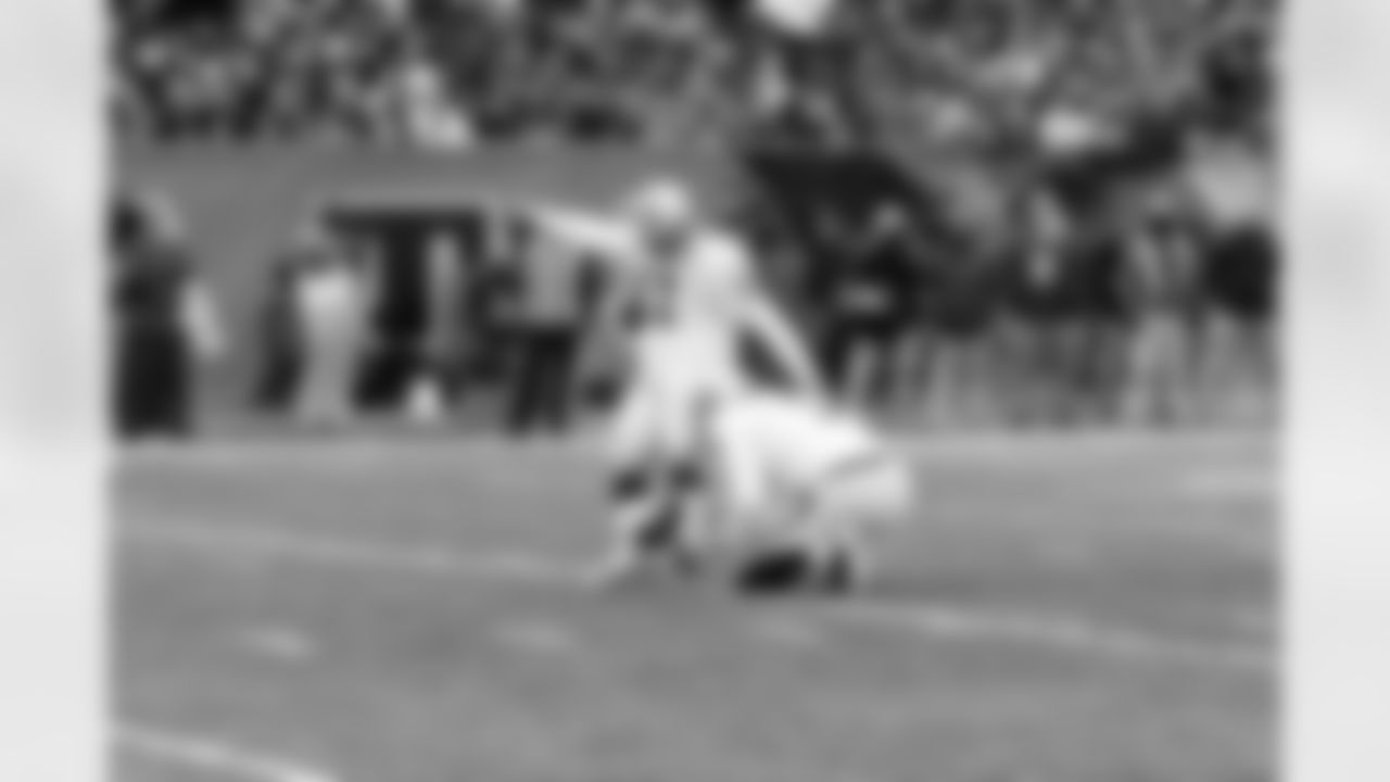 K Sebastian Janikowski kicks the extra point.