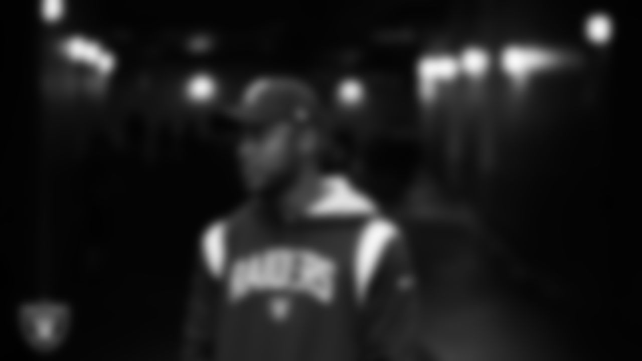Las Vegas Raiders offensive assistant Fred Walker walks down the tunnel before the regular season away game against the Tennessee Titans at Nissan Stadium.