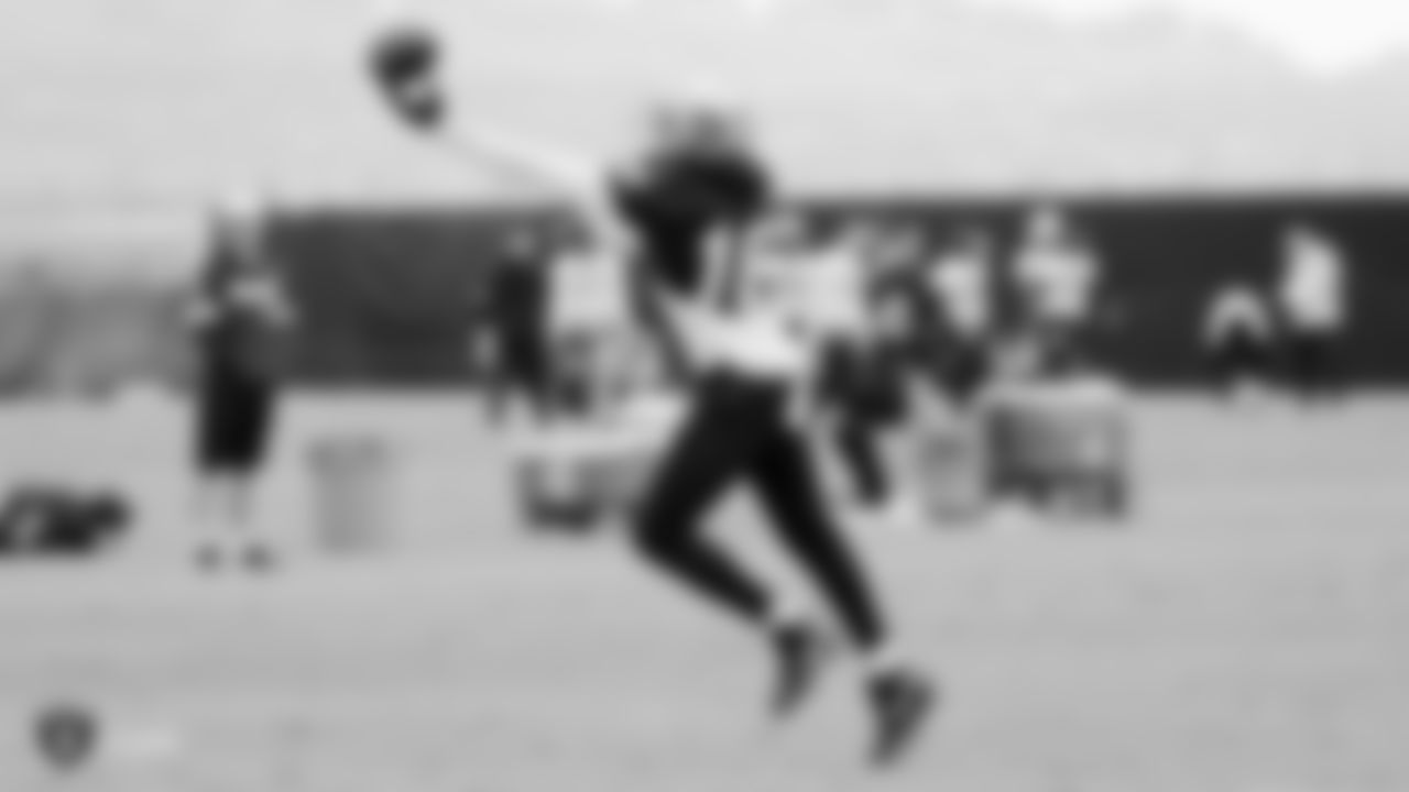 Raiders wide receiver Tyrell Williams (16) goes for a catch during practice.