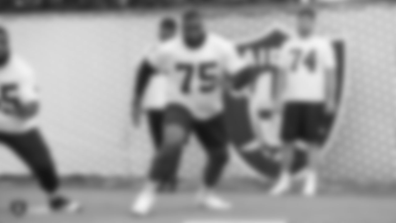 Raiders tackle Brandon Parker (75) at a workout during phase two of the offseason program at the Raiders Practice Facility in Alameda, Calif.