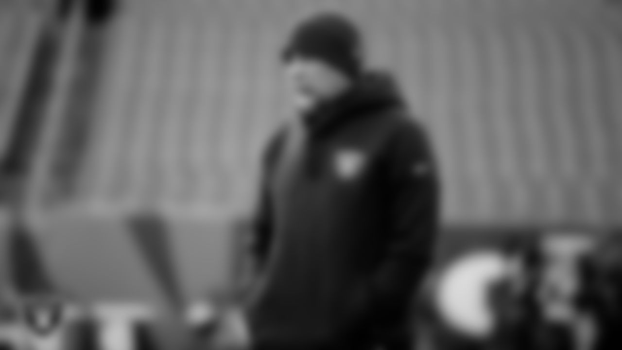 Las Vegas Raiders Interim Head Coach Rich Bisaccia warming up before the postseason away game against the Cincinnati Bengals.