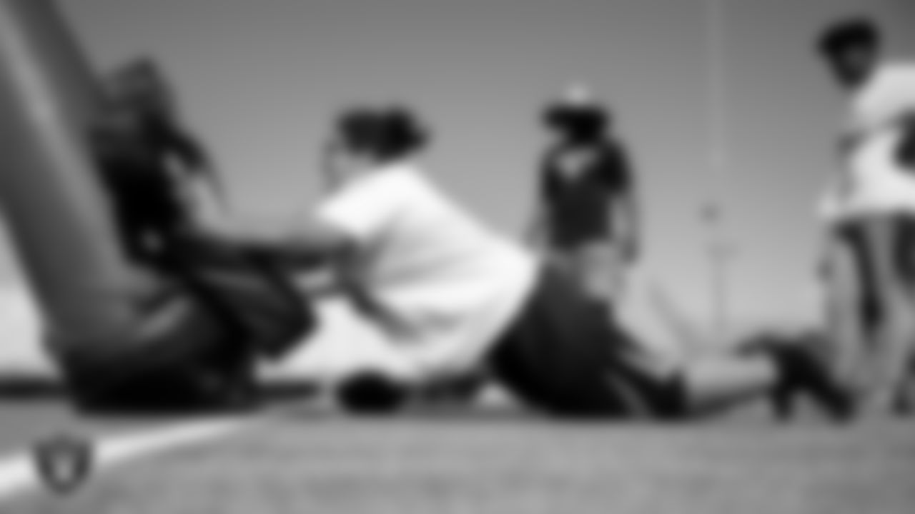 An athlete participates in a drill during a Raiders Prospect Camp at Bonanza High School.