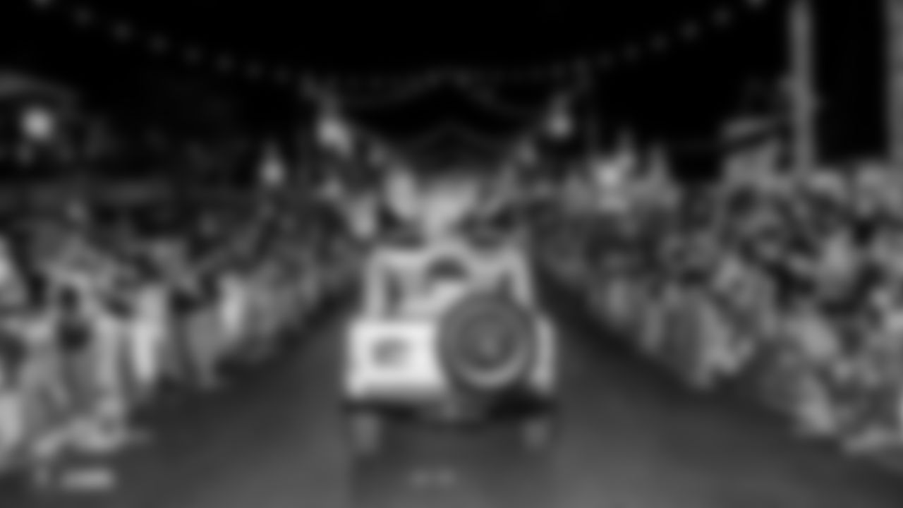 The Raiderettes are featured in the annual Holidays/Santa's Arrival Parade as they proceed in convertible cars through Town Square, Friday, November 16, 2018, in Las Vegas, Nevada.