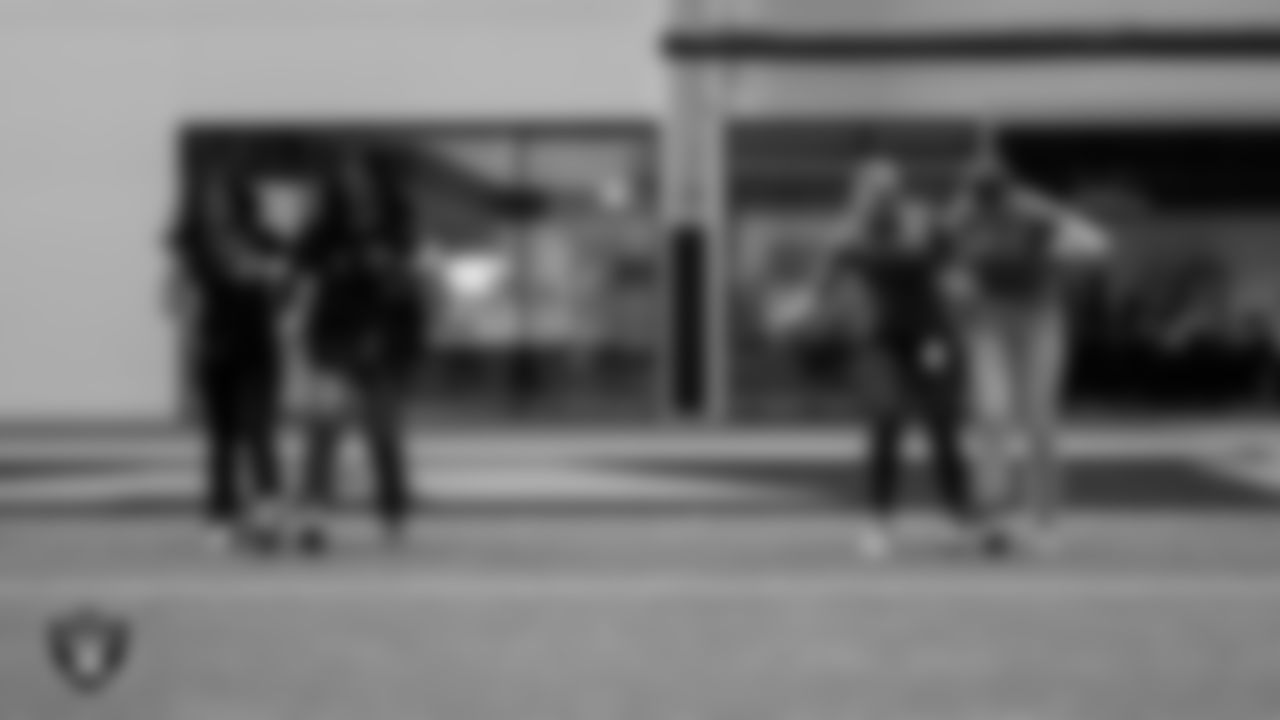 Las Vegas Raiders staff members take part in a three-legged race during the B.A.S.E.D. in Sports Family Reunion at Intermountain Health Performance Center.