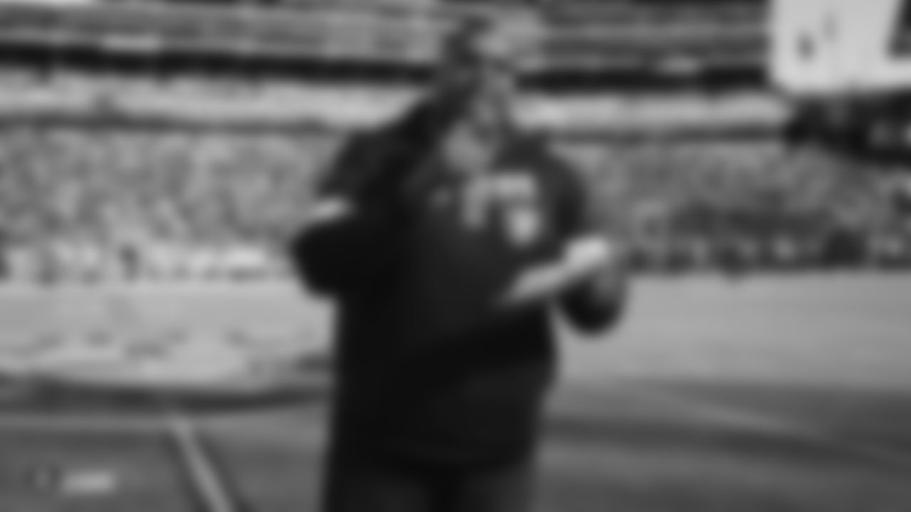 Raiders alumnus and radio broadcaster Lincoln Kennedy pumps up the crowd before the Raiders regular season game against the Jacksonville Jaguars.