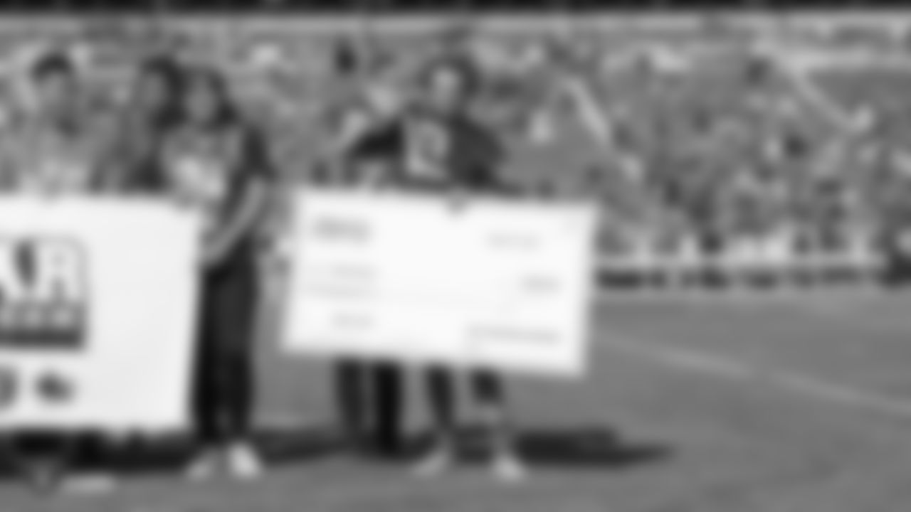 The Bay Area All-Stars Scholarship Team recipients are honored on the field before the Raiders preseason game against the Los Angeles Rams.