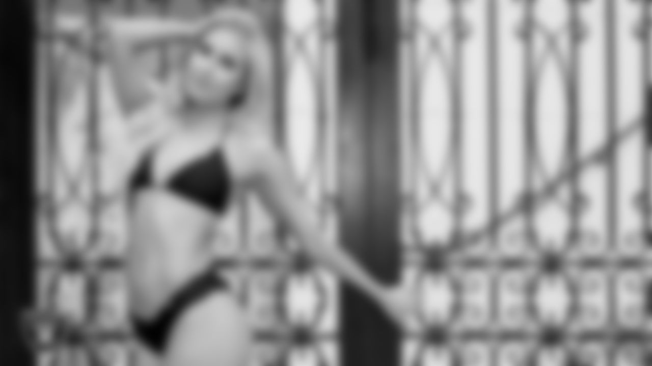 Raiderette Madison E. poses for the 2021 Raiderettes Swimsuit Photoshoot at Bellagio Resort and Casino.