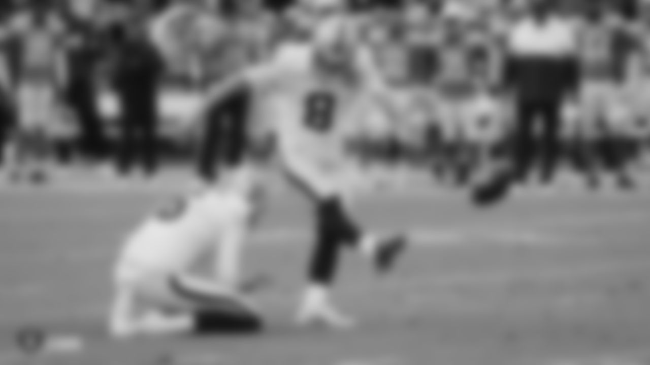 Raiders kicker Daniel Carlson (8) kicks a PAT during the regular season game against the Los Angeles Chargers.