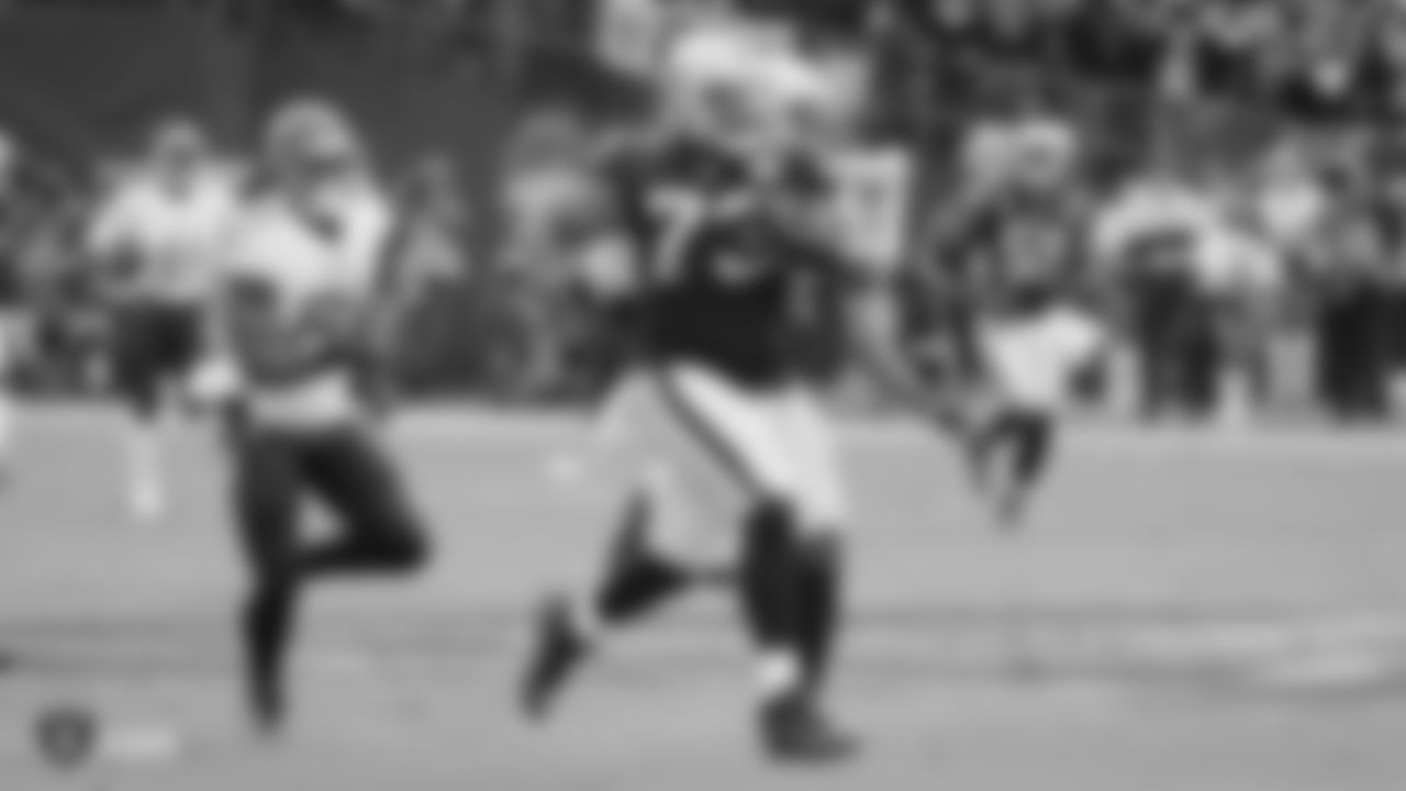 Raiders defensive tackle Maurice Hurst (73) returns an interception 55 yards during the regular season game against the Tennessee Titans.