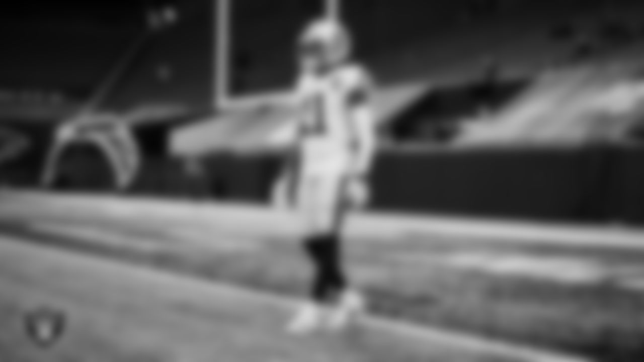 The Raiders warm up before the regular season game against the Atlanta Falcons at Mercedes-Benz Stadium.