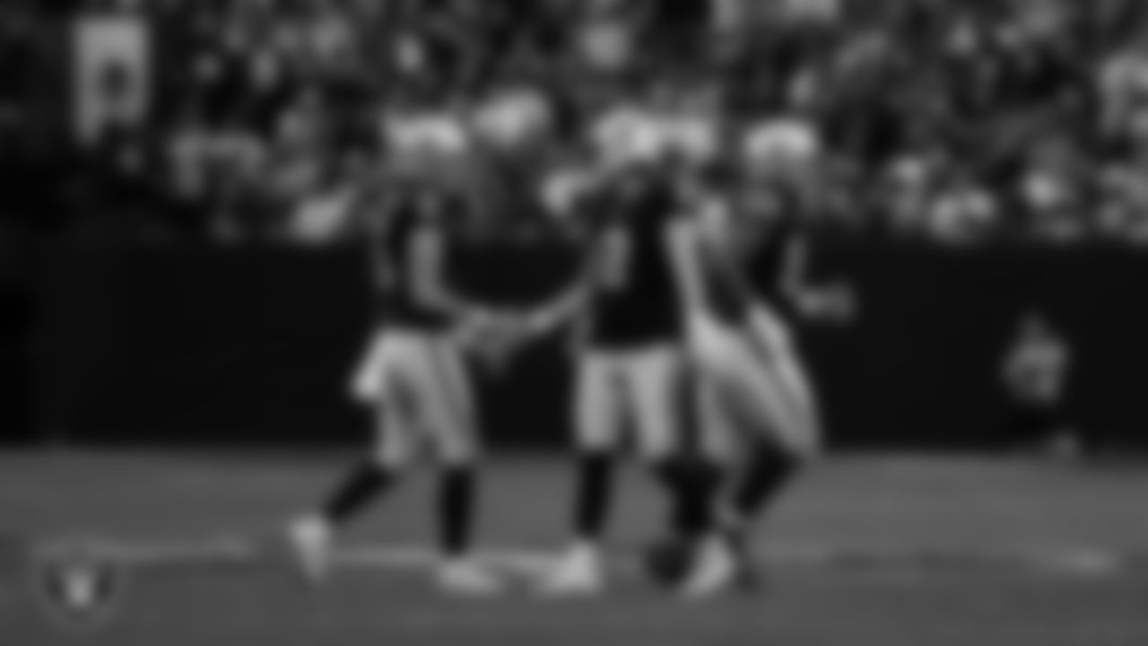 Las Vegas Raiders kicker Daniel Carlson (2) with punter AJ Cole (6) after kicking a 54-yard field goal during the regular season home game against the Kansas City Chiefs at Allegiant Stadium.
