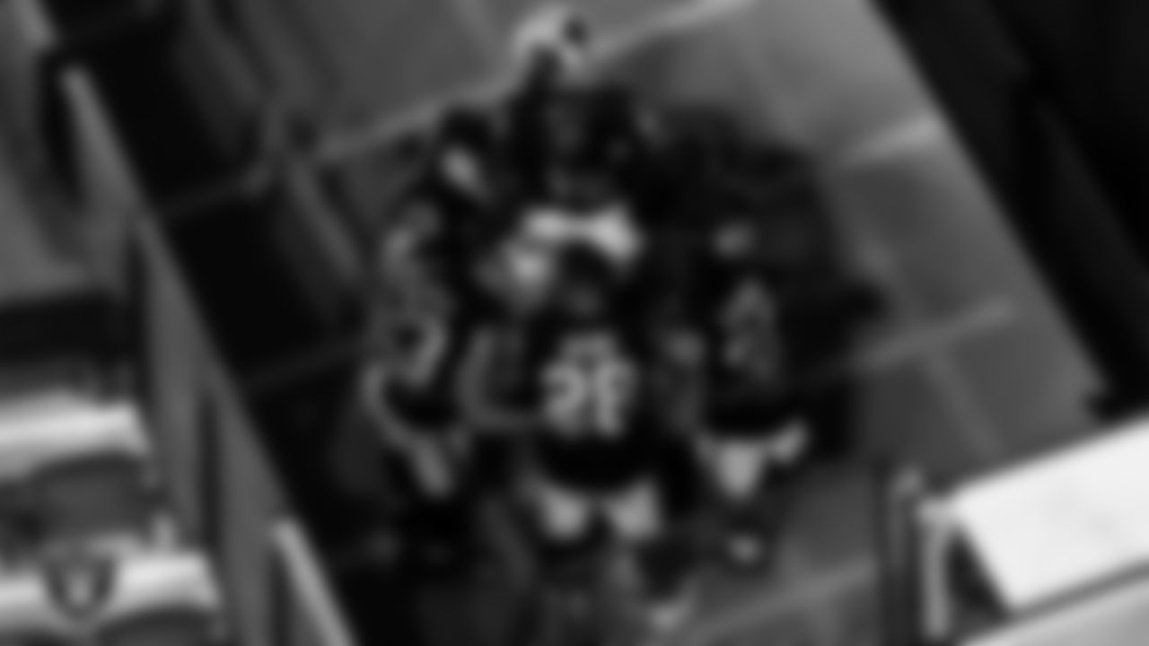 The Las Vegas Raiders special team returners huddle in the tunnel before the regular season home game against the Los Angeles Chargers.