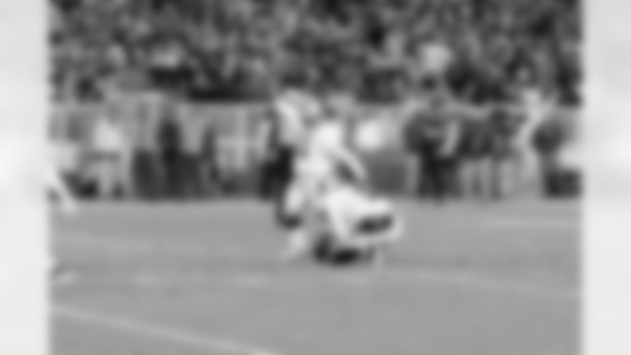 K Sebastian Janikowski kicks the extra point.