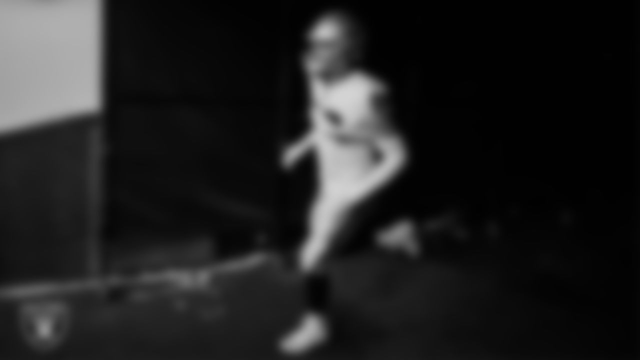 Las Vegas Raiders defensive end Maxx Crosby (98) walks down the tunnel before the regular season away game against the Denver Broncos at Empower Field at Mile High.
