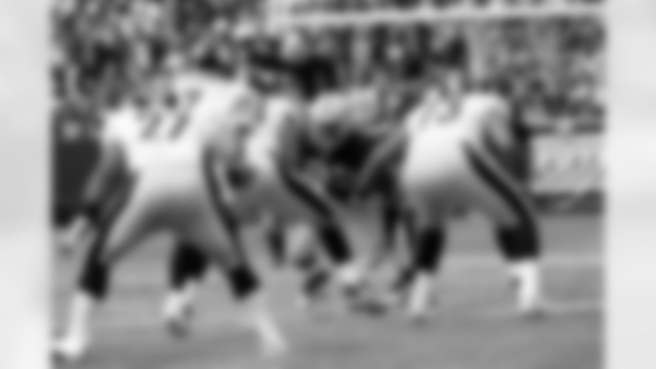 DE Lamarr Houston takes on the offensive line.