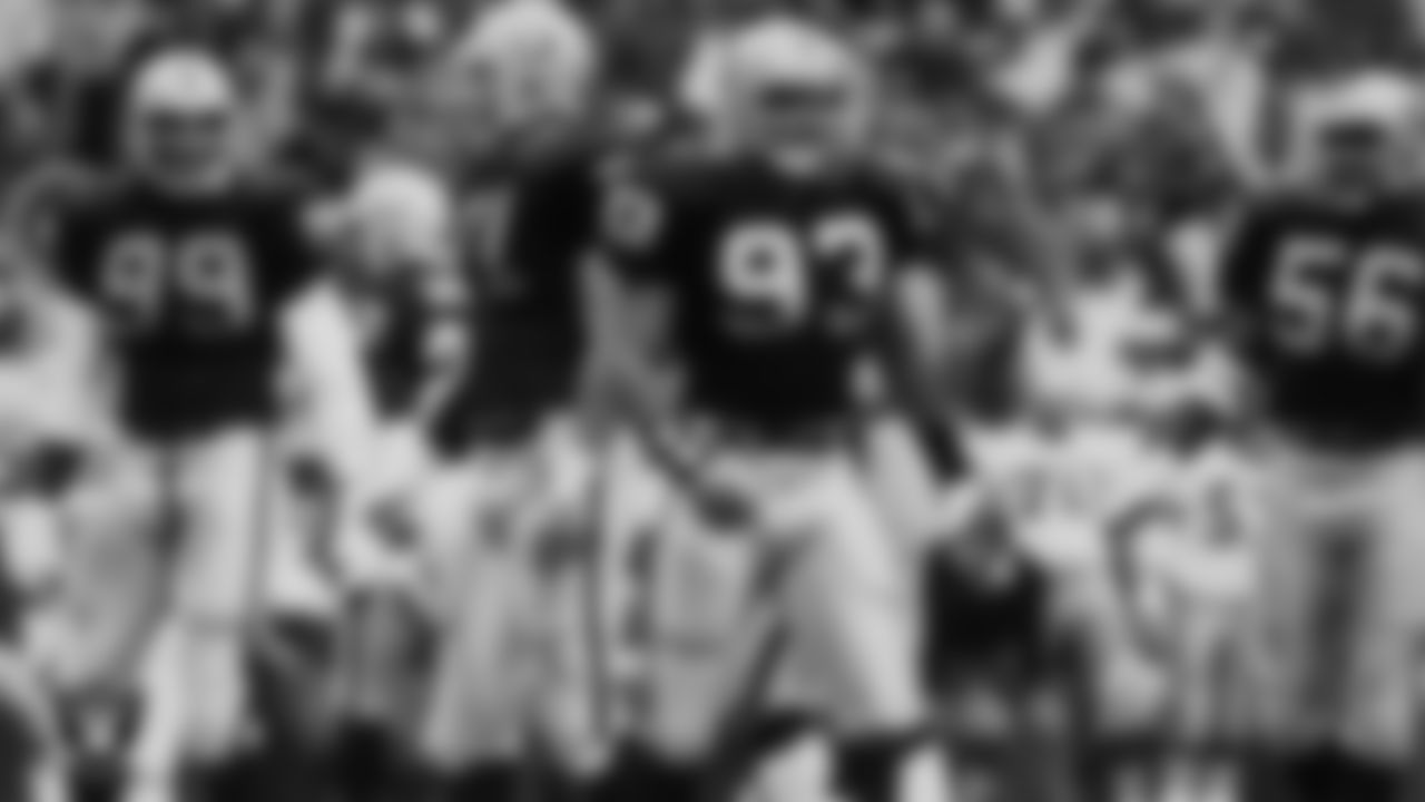 Los Angeles Raiders defensive end Sean Jones (99), defensive tackle/defensive end Bill Pickel (71) and defensive end/linebacker Greg Townsend (93) line up before the snap during the regular season away game against the Dallas Cowboys at Texas Stadium, Sunday, November 9, 1986, in Irving, Tex.