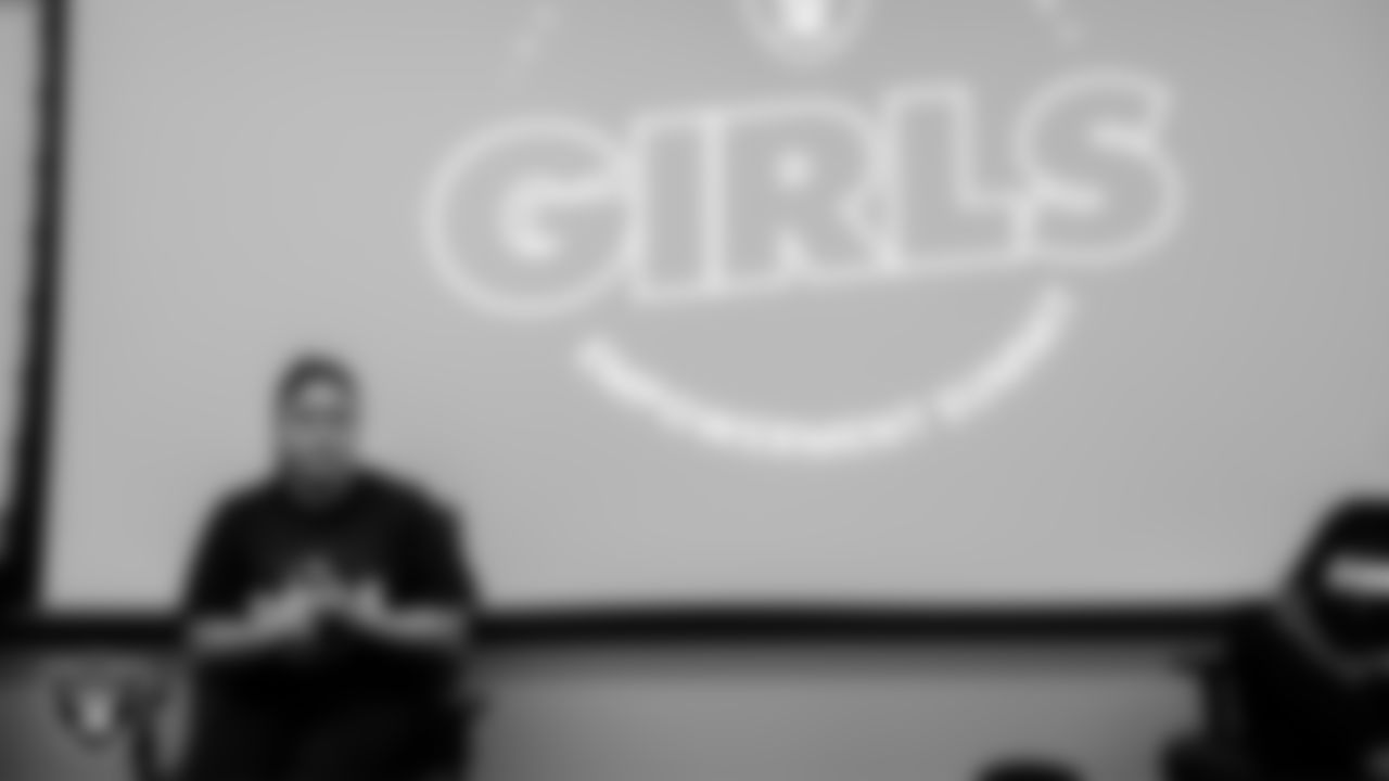 Las Vegas Raiders director of stadium operations and guest experience Chloe Janfaza speaks to student-athletes during the Raiders Girls Empowerment Summit at the Las Vegas Raiders Headquarters.
