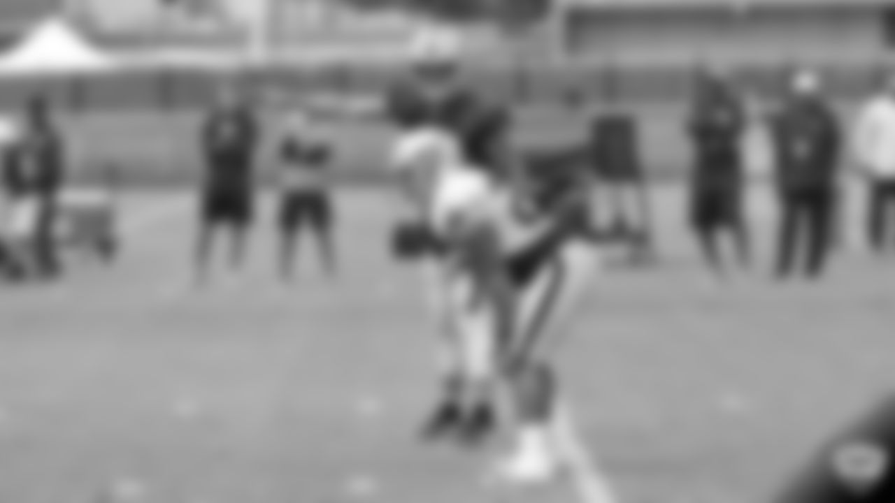 Raiders quarterback Derek Carr (4) and running back Doug Martin (22) on the field for practice at 2019 Training Camp.