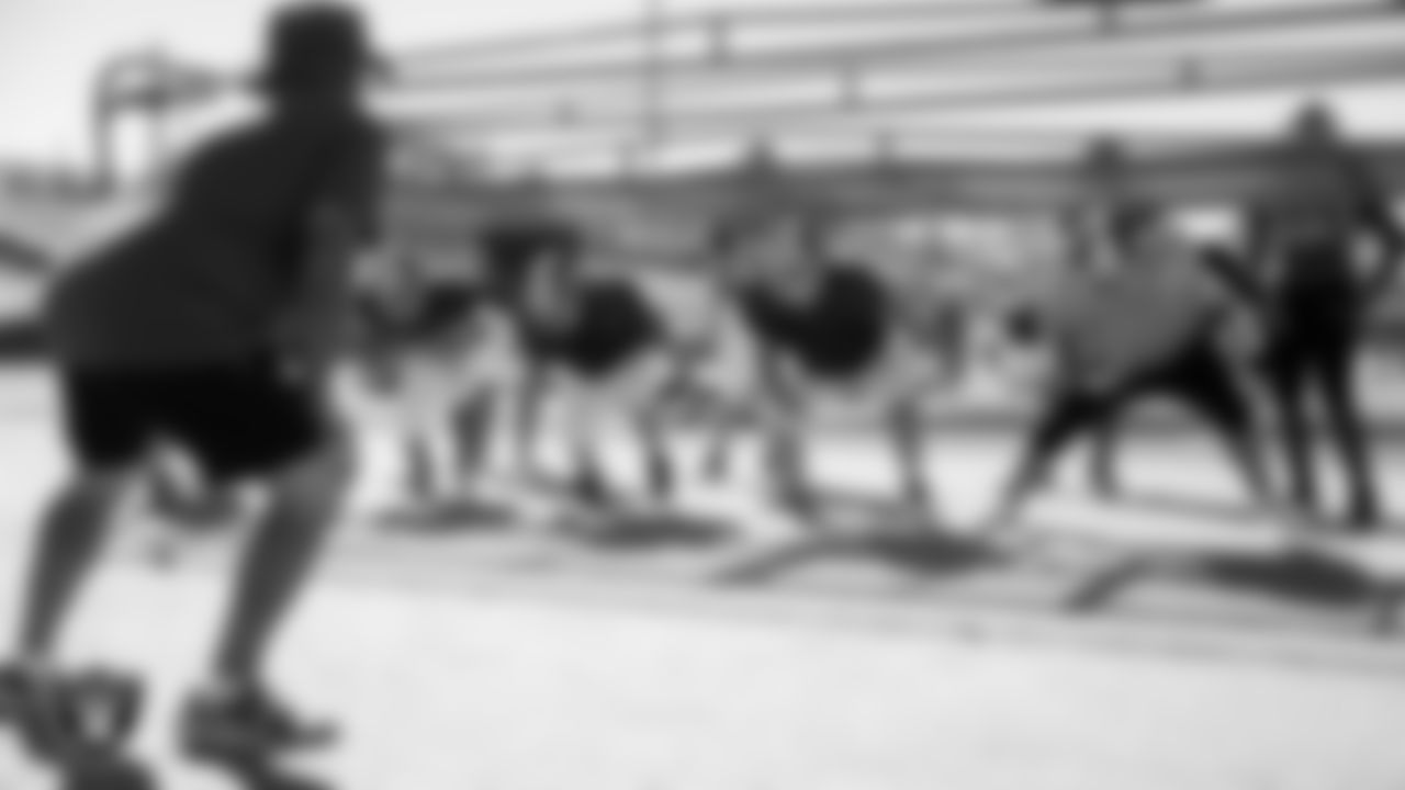 Members of the Green Valley High School football team go through a drill during practice at Green Valley High School.