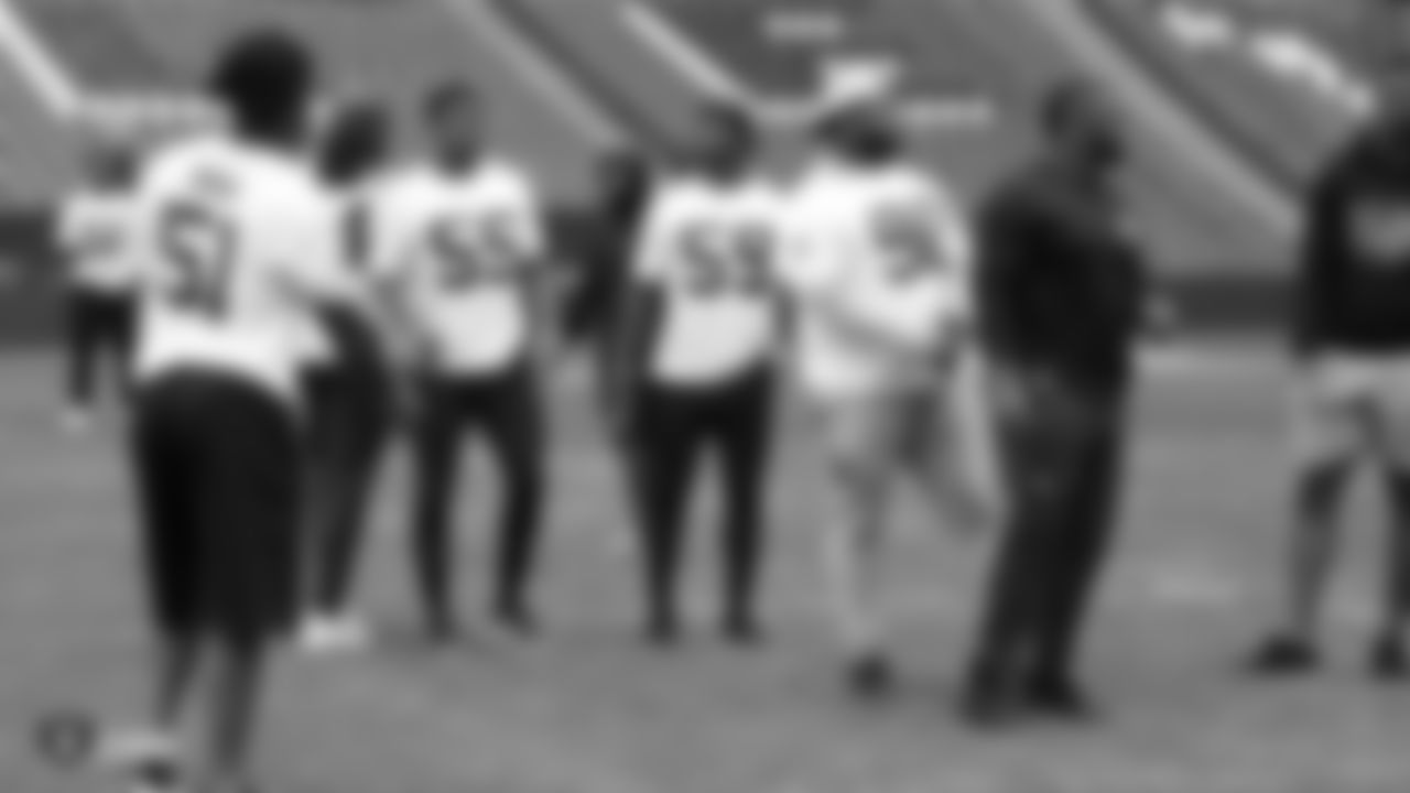 Oakland Raiders linebacker Marquel Lee (55), linebacker Tahir Whitehead (59), defensive tackle Jonathan Hankins (90), and defensive tackle Maurice Hurst (73) on the field for a walk through before their game against the Seattle Seahawks, Saturday, October 13, 2018, in London, England.