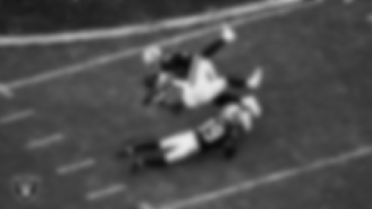 Las Vegas Raiders linebacker K.J. Wright (34) and cornerback Nate Hobbs (39) during the regular season home game against the Washington Football Team.