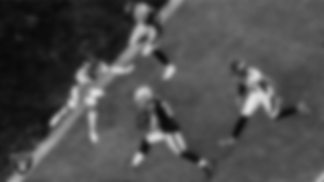 Las Vegas Raiders running back Josh Jacobs (28) rushes for an 11-yard touchdown during the regular season home game against the Denver Broncos.