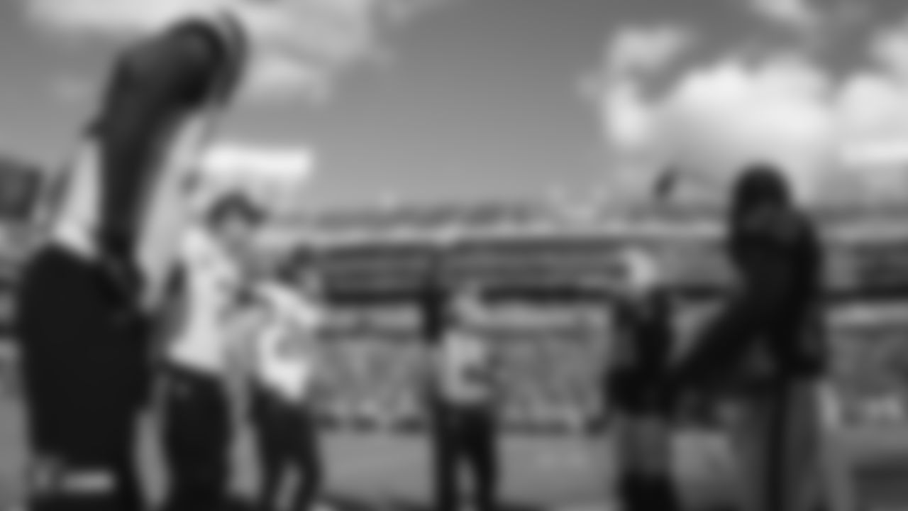 Raiders quarterback Derek Carr (4) and safety Lamarcus Joyner (29) during the coin toss before the regular season game against the Jacksonville Jaguars.
