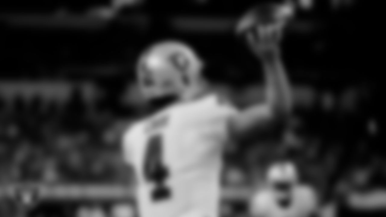 Las Vegas Raiders quarterback Derek Carr (4) warming up before the regular season away game against the Indianapolis Colts.