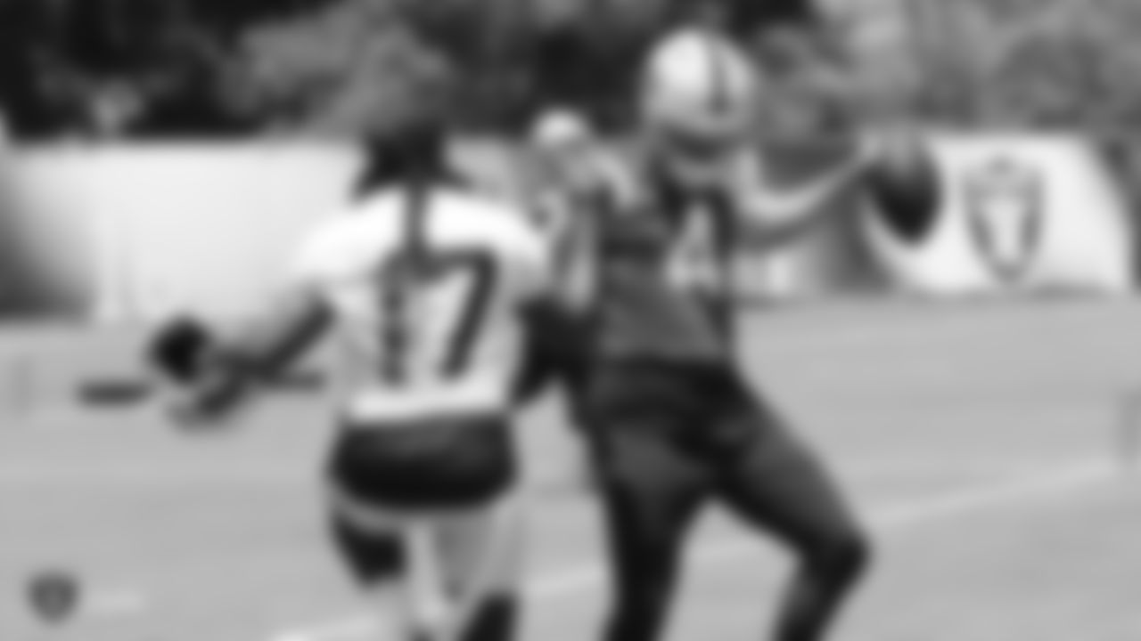 Raiders wide receiver/return specialist Dwayne Harris (17) and quarterback Derek Carr (4) at a Mandatory Minicamp at the Raiders Practice Facility in Alameda, Calif.