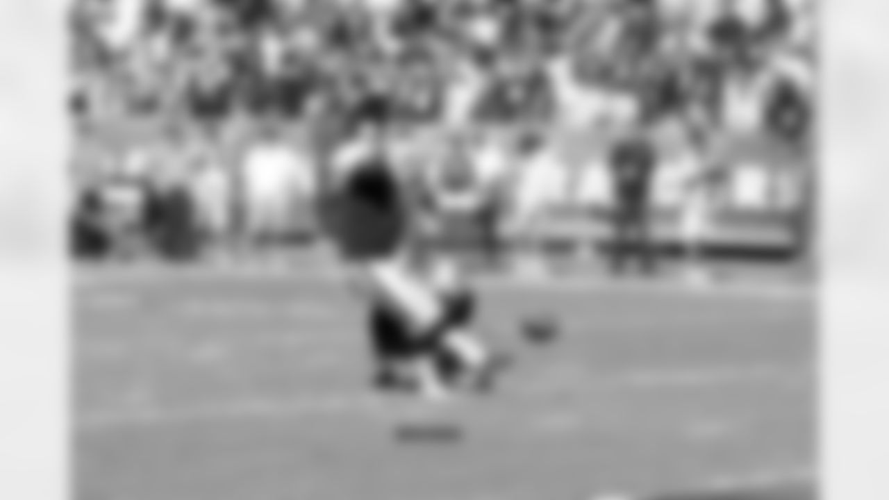 K Sebastian Janikowski kicks the extra point.