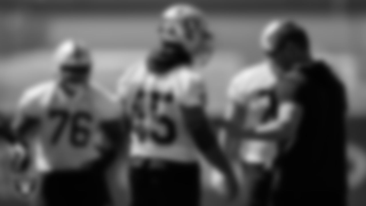 Las Vegas Raiders fullback Jakob Johnson (45) and head strength and conditioning coach A.J. Neibel at an Organized Team Activity (OTA).
