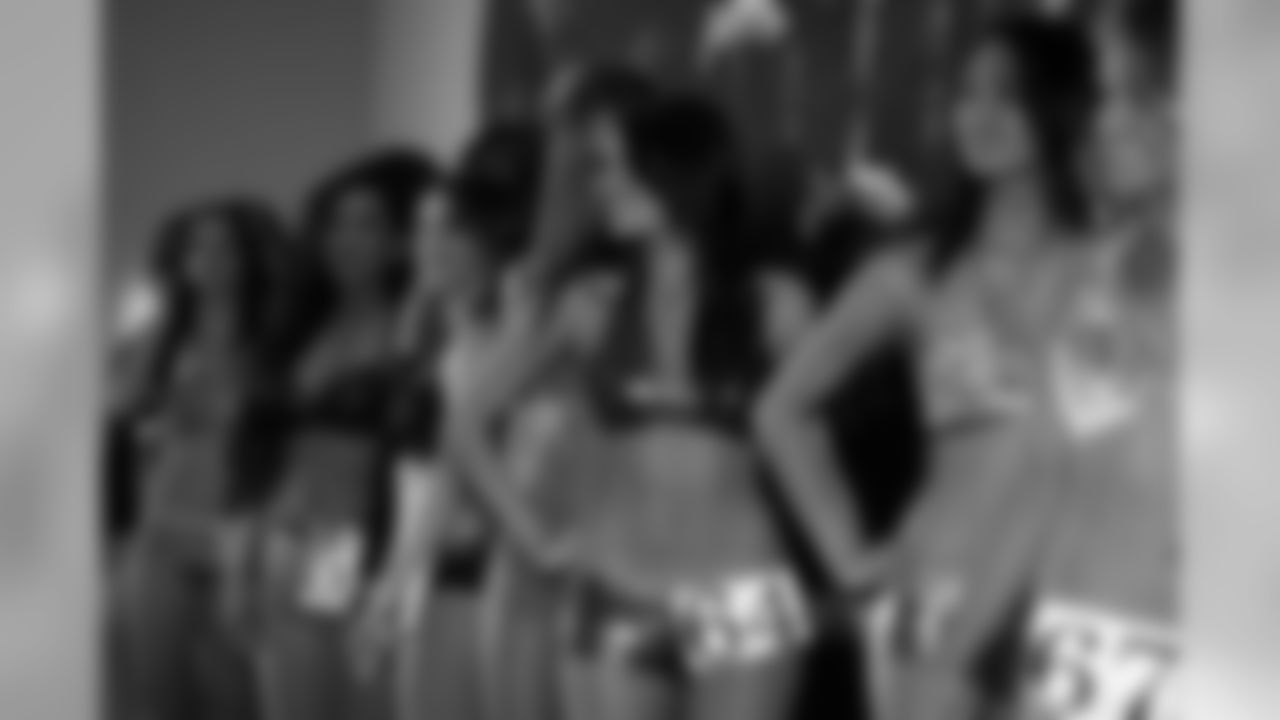 The group of Raiderette hopefuls walk off the stage after the dance routine portion of the auditions. Photo by Tony Gonzales.